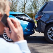 Driver Making Phone Call After Traffic Accident