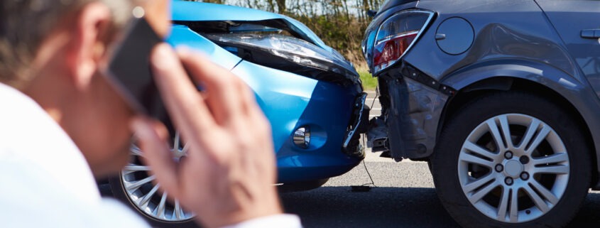 Driver Making Phone Call After Traffic Accident